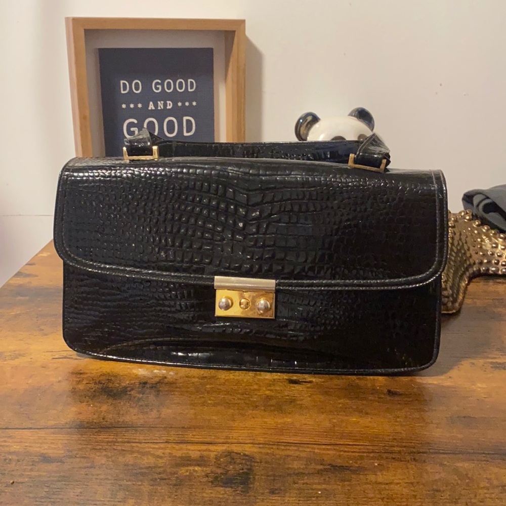 Saks Fifth Avenue handbag.